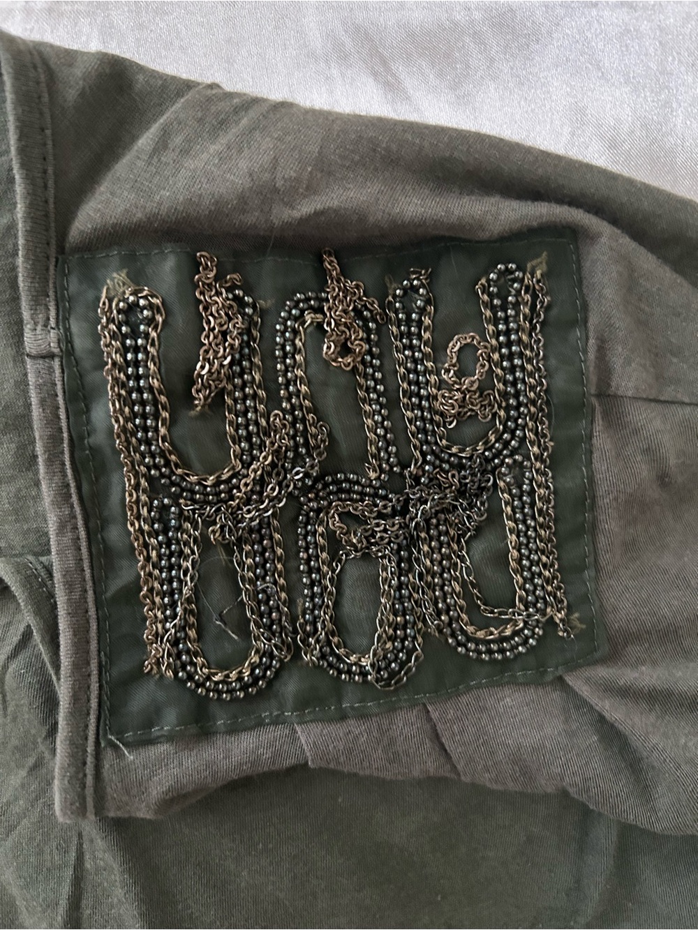 ELLE Olive Embellished Shoulder Short Sleeve Tee